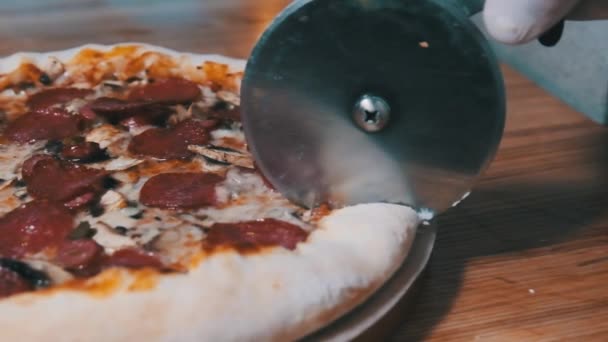 Cutting Pizza with a Round Cutter Knife. Slow Motion 240 fps — Stock Video