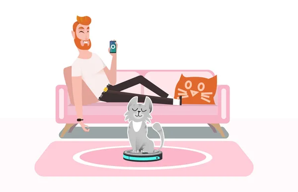 Akıllı elektrikli süpürge. Bir adam bir elektrikli süpürge bir smartphone kullanarak rahat bir koltukta yalan denetler. Kedi bir elektrikli süpürge ile oynar, akıllı elektrikli süpürge sürmek, ev aletleri hareketli avı