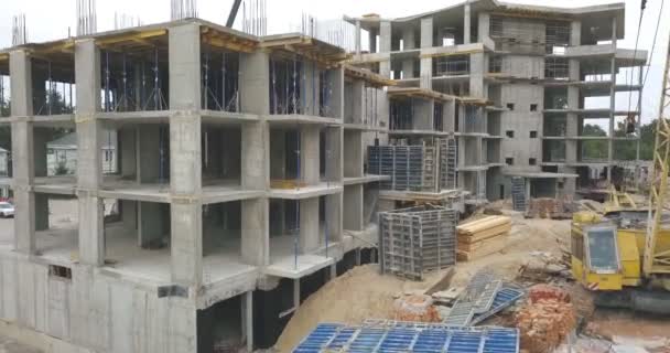 flight construction site concrete frame multi storey building concrete formwork stock video c oleg 0 227003202 flight above the construction site of the concrete frame of a multi storey building concrete formwork and metal structures for building a house