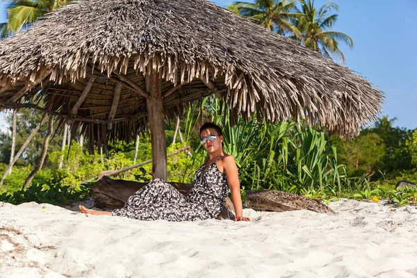 Beautiful Girl Overalls Sunglasses Sits Beach Umbrella Cane Beach High — Stock Photo, Image