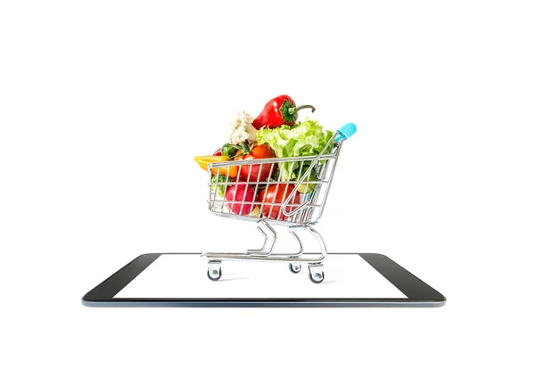 Carrito Compras Con Verduras Frescas Cerca Encuentra Una Tableta Teléfonos —  Fotos de Stock