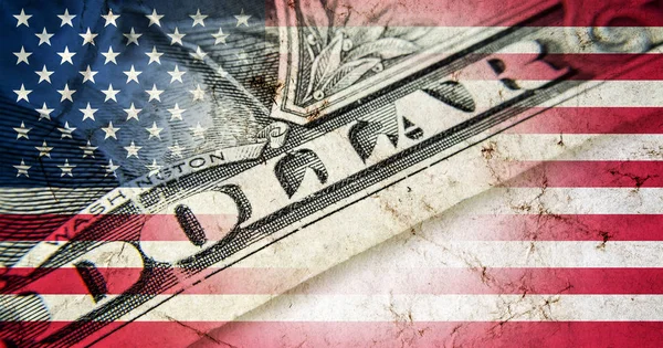 Flag of America with old grunge texture and a one hundred dollar bill closeup