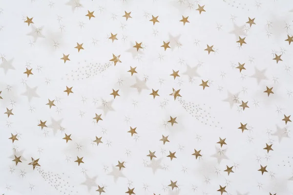 Abstract background with golden stars on a white background