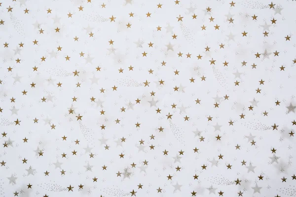 Arka plan beyaz zemin üzerine altın yıldız