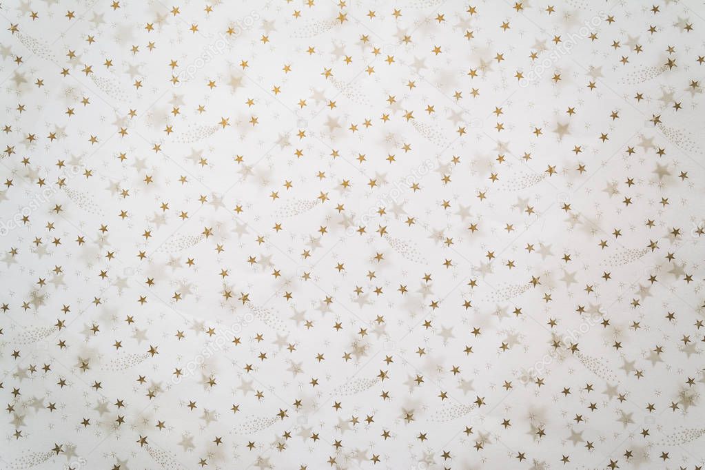 Abstract background with golden stars on a white background