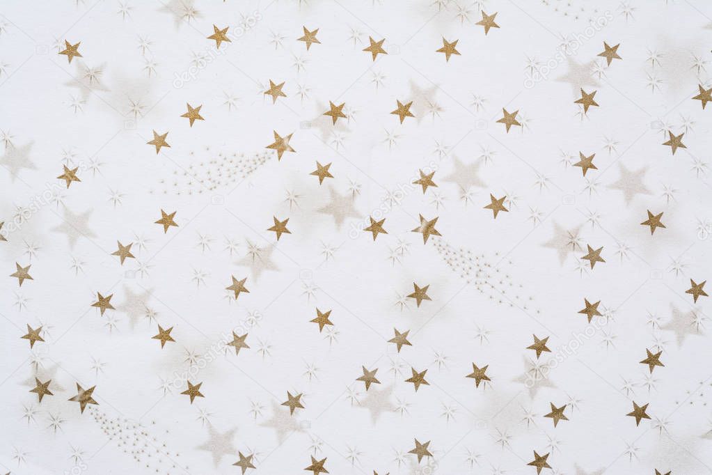 Abstract background with golden stars on a white background