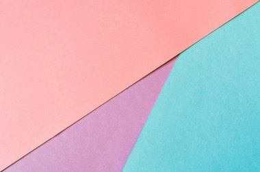 Yumuşak mavi, leylak ve mercan renklerde çok renkli kağıt arka plan.