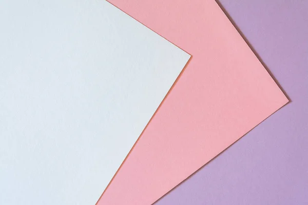 Veelkleurige papier achtergrond met trendy koraal kleur van het jaar 2019. Abstracte kleurrijke papier achtergrond met zachte lichte trendy koraal kleur. — Stockfoto