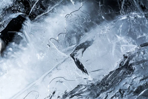 Textura de gelo fundo macro close up na luz solar. Belos padrões abstratos de água congelada . — Fotografia de Stock