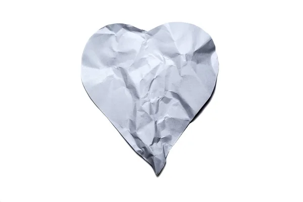 Heart symbol from old, crumpled paper isolated on a white background. — Stock Photo, Image