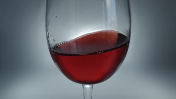 Creative Macro Slow Motion Raw Video Red Wine Splashing Glass — Stock Video