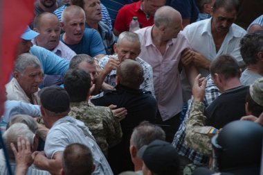 19 Haziran 2018. Kiev, Ukrayna. Çatışmalar Ukrayna parlamento dışında. Madenci, Chornobyl temizlik işçileri ve Sovyet-Afgan Savaşı gazileri gibi protestocular geliştirilmiş devlet destek talep etti..
