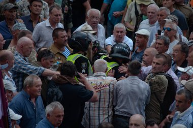 19 Haziran 2018. Kiev, Ukrayna. Çatışmalar Ukrayna parlamento dışında. Madenci, Chornobyl temizlik işçileri ve Sovyet-Afgan Savaşı gazileri gibi protestocular geliştirilmiş devlet destek talep etti..