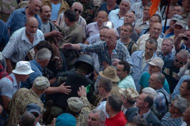 19 Haziran 2018. Kiev, Ukrayna. Çatışmalar Ukrayna parlamento dışında. Madenci, Chornobyl temizlik işçileri ve Sovyet-Afgan Savaşı gazileri gibi protestocular geliştirilmiş devlet destek talep etti..