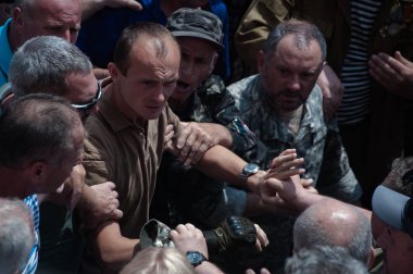 19 Haziran 2018. Kiev, Ukrayna. Çatışmalar Ukrayna parlamento dışında. Madenci, Chornobyl temizlik işçileri ve Sovyet-Afgan Savaşı gazileri gibi protestocular geliştirilmiş devlet destek talep etti..