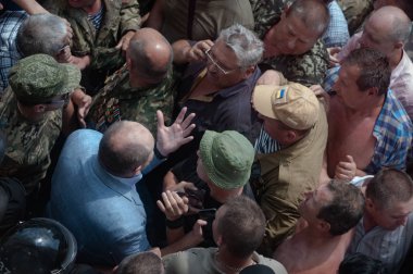 19 Haziran 2018. Kiev, Ukrayna. Çatışmalar Ukrayna parlamento dışında. Madenci, Chornobyl temizlik işçileri ve Sovyet-Afgan Savaşı gazileri gibi protestocular geliştirilmiş devlet destek talep etti..