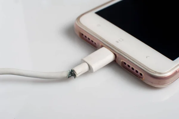 Close Image Damaged Charger Cable Connecting Smartphone Gray Background — Stock Photo, Image