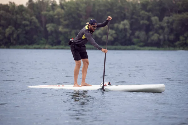 Bearded Athlete Involved Water Sports Young Guy Standing Oar While — Stock Photo, Image