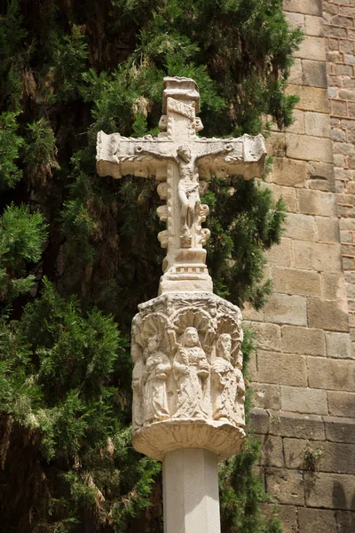 The crucifixion of Christ in the courtyard Church St. Anne, Esglesia Santa Anna which is one of the oldest churches of the Gothic quarter of Barcelona, Catalonia, Spain.
