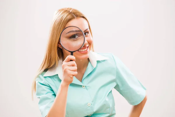 Young Excited Nurse Looking Loupe — Stock Photo, Image