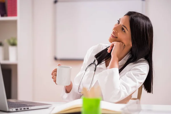 Young Doctor Drinking Coffee Her Office — Stock Photo, Image