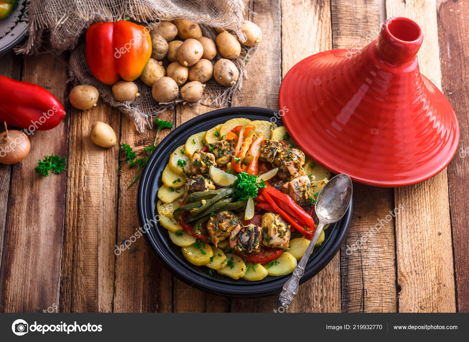 Chermoula fish tajine with bell peppers, moroccan cousine. Stock Photo