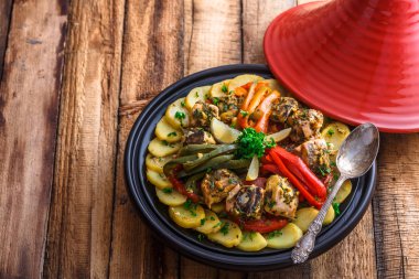 Fish tagine with chermoula, moroccan cuisine copy space clipart