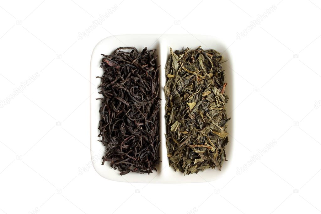 Green tea and black tea in square white saucer on white background