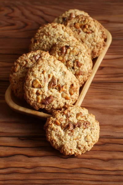 Oatmeal Cookies Walnuts Raisins Bamboo Plate Standing Wooden Table — Stock Photo, Image