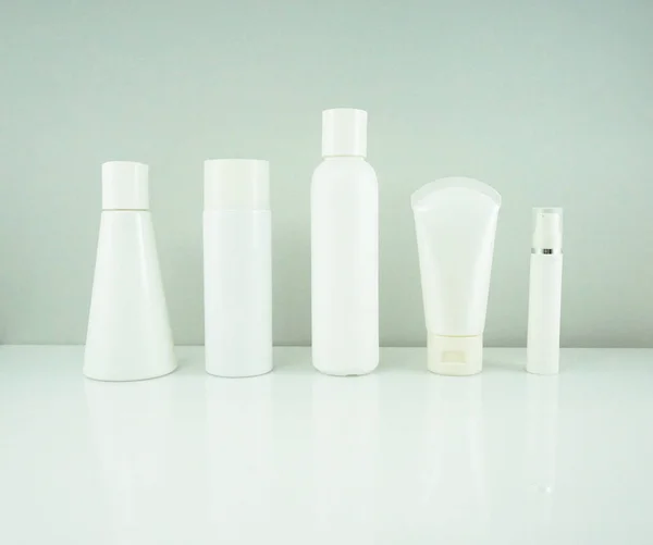Collection of plastic bottle packaging for cream, lotion, medicine, shampoo or liquid soap isolated. Blank skincare beauty product template.