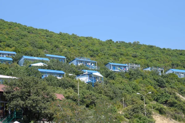 Houses on the mountain for tourists. A house among the trees.