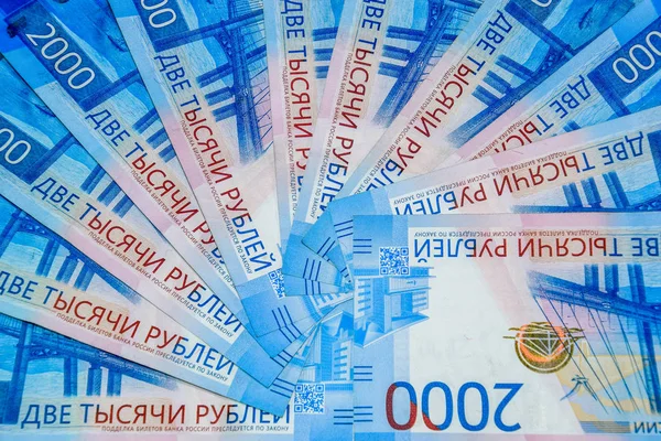 Russian money banknotes in nominal value of two thousand. New tickets of the bank of Russia. Russian money. — Stock Photo, Image