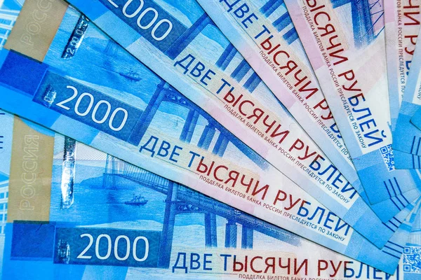 Russian money banknotes in nominal value of two thousand. New tickets of the bank of Russia. Russian money.