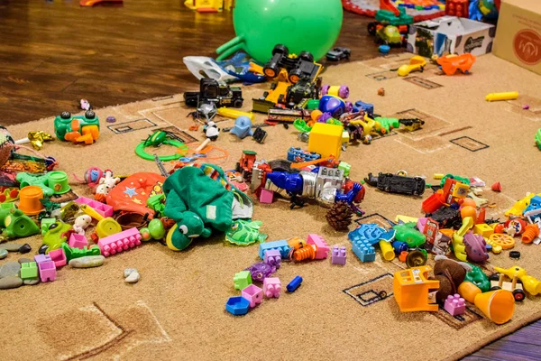 Childrens toys on the carpet. Bardak in the childrens room — Stock Photo, Image