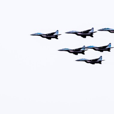 Krasnodar, Russia - February 23, 2017: Air show in the sky above the Krasnodar airport flight school. Airshow in honor of Defender of the Fatherland. MiG-29 in the sky. clipart