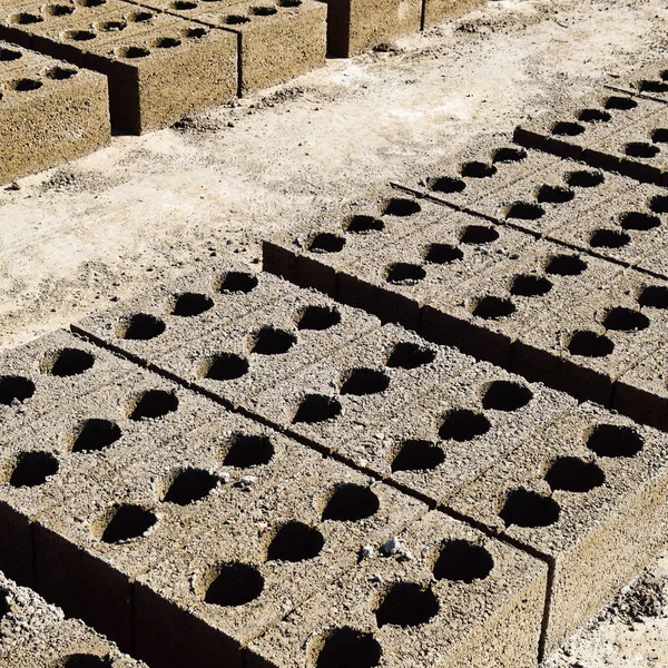 Cinder blocks lie on the ground and dried. on cinder block production plant