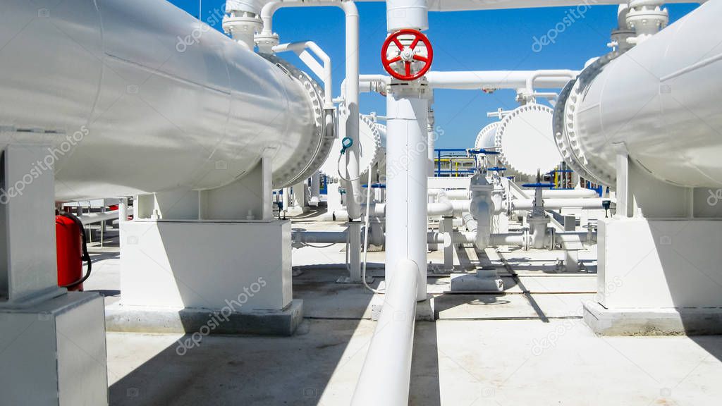 Heat exchangers in a refinery. The equipment for oil refining. Heated gasoline air cooler