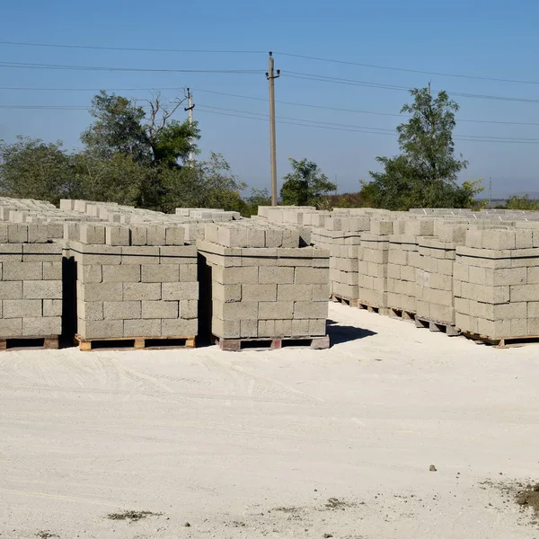 Cinder blocks, which lie in the bays. Storage cinder block