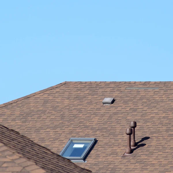 Decorative metal tile on a roof — Stock Photo, Image