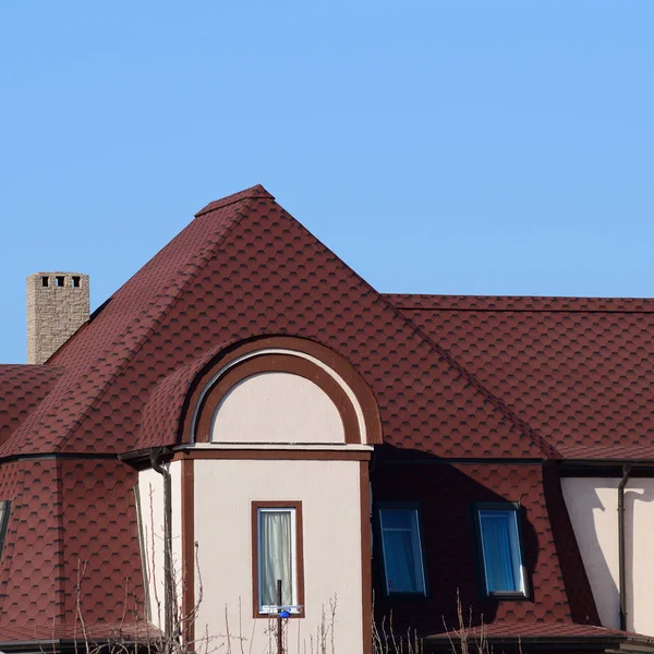 Decorative metal tile on a roof — Stock Photo, Image