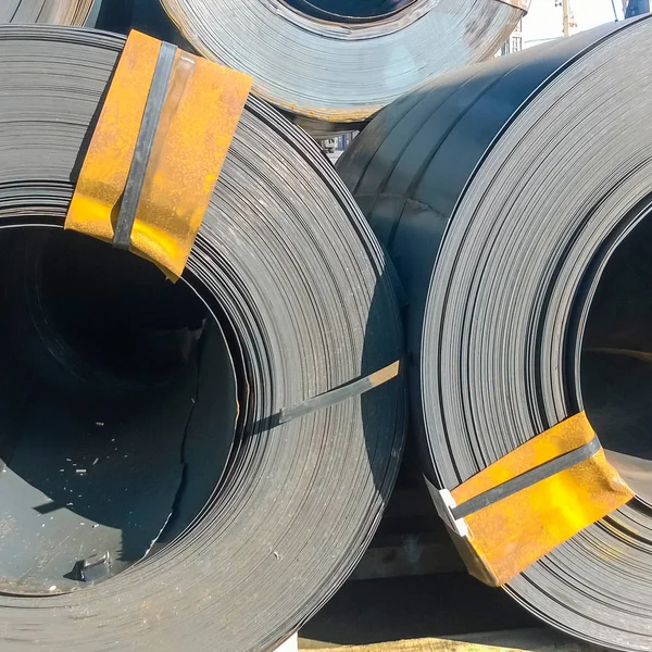 Steel sheets rolled up into rolls. Export Steel. Packing of steel for transportation