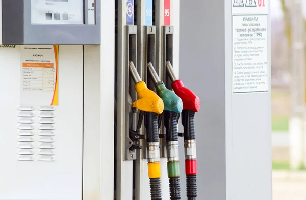 Pistols of the gas station. Different types of fuel at the gas station. — Stock Photo, Image