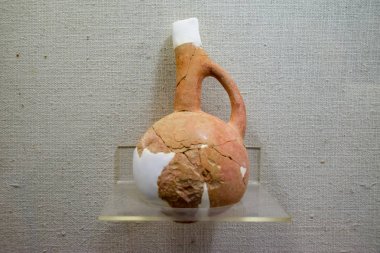 Ancient pottery, vessels and amphorae in Antalya Museum of Antiquities. clipart