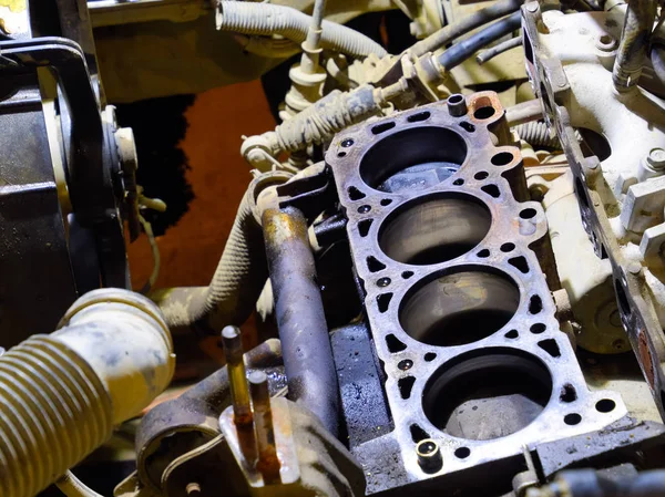 The cylinder block of the four-cylinder engine. Disassembled mot