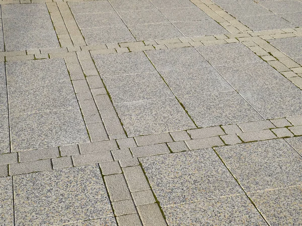Descubra as lajes de pavimentação na praça. Fundo de lajes de pavimentação. Textura de produtos de pedra — Fotografia de Stock