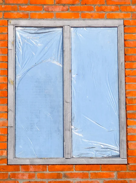 The window on the front of the building, fitted by the inside reflective film — Stock Photo, Image