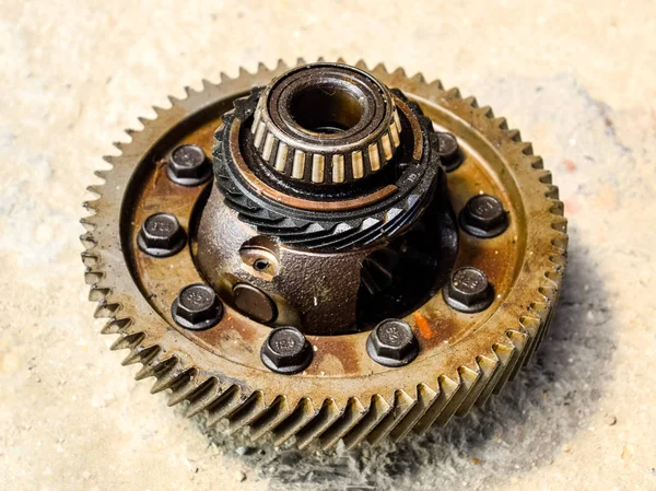 Dismantled box car transmissions. Gear with bearings. The gears on the shaft of a mechanical transmission.