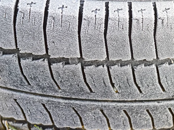 Hoarfrost on a rubber tire wheel — Stock Photo, Image