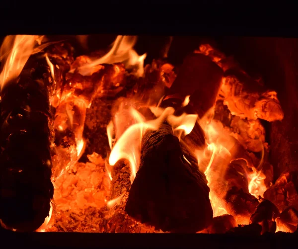 Hot coals in the stove — Stock Photo, Image