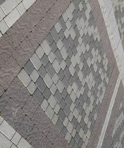 Figuur uit de platen van de bestrating op het plein. Achtergrond van de bestrating van de platen. Textuur van stenen producten — Stockfoto